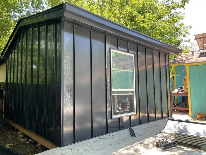 Black standing seam metal wall panels for Roof Inspection in Sterling